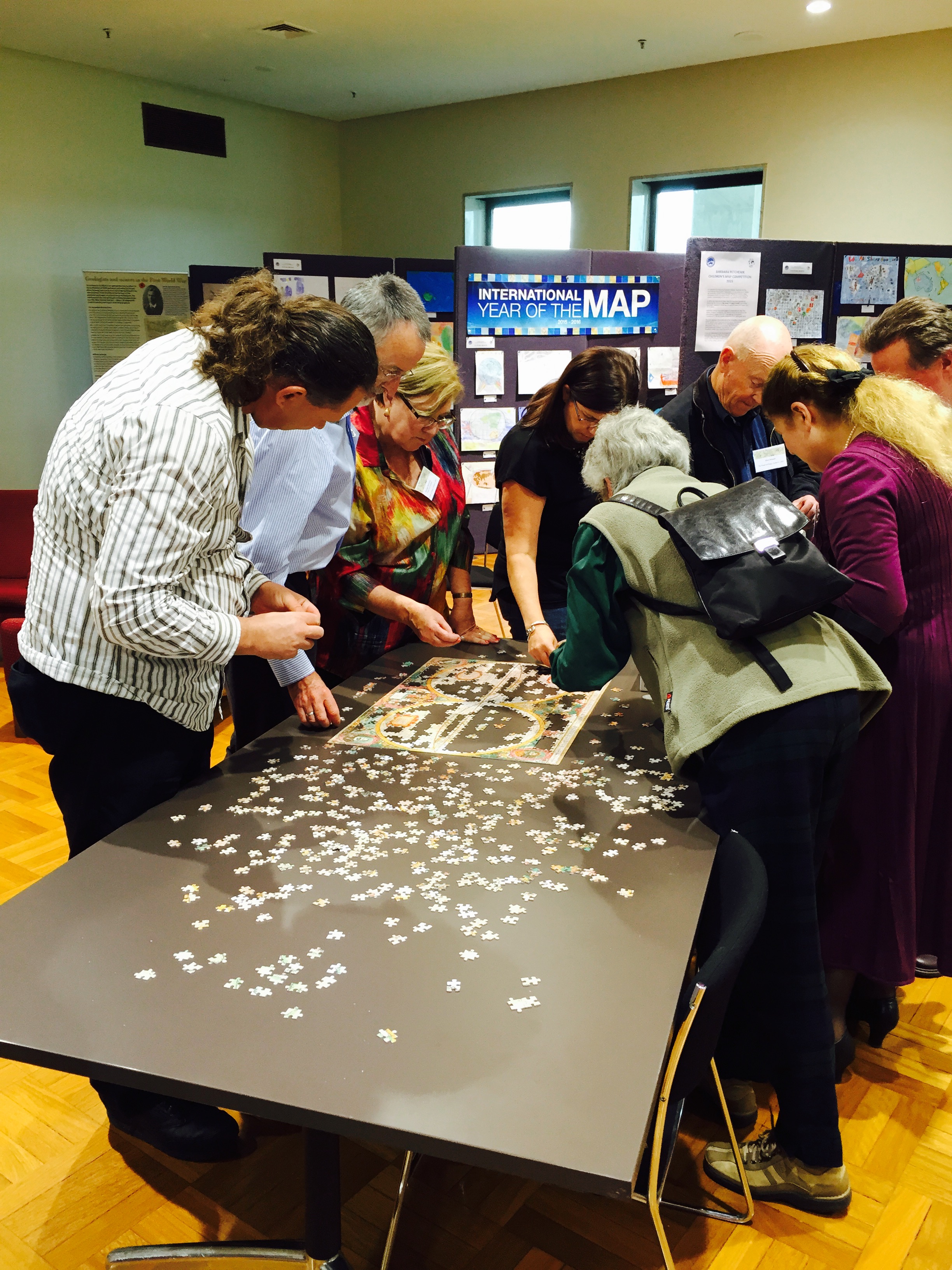 Attendees enjoying the challenge of a good jigsaw puzzle